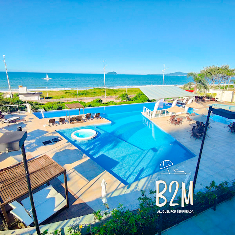 Pé na areia, piscina borda infinita, homeclub Bali